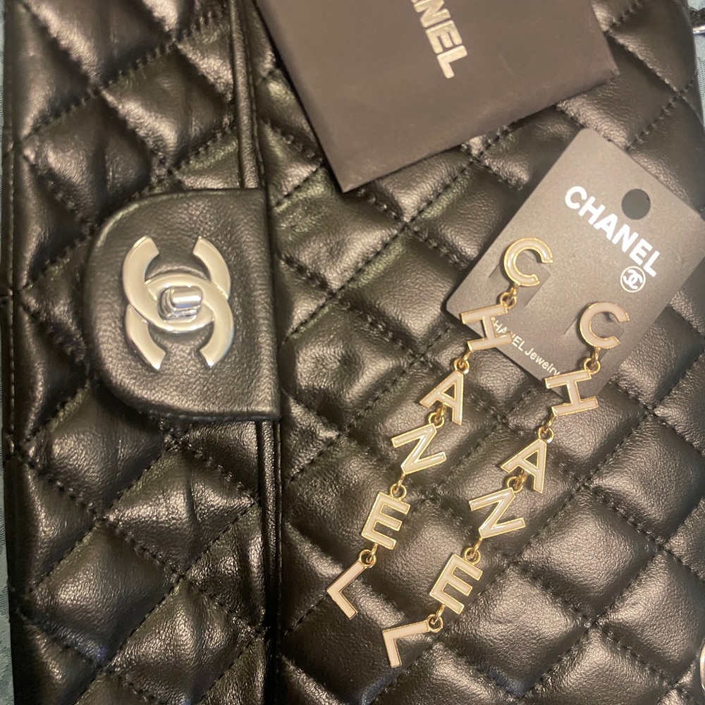 CHANEL White and Gold Letter Earrings